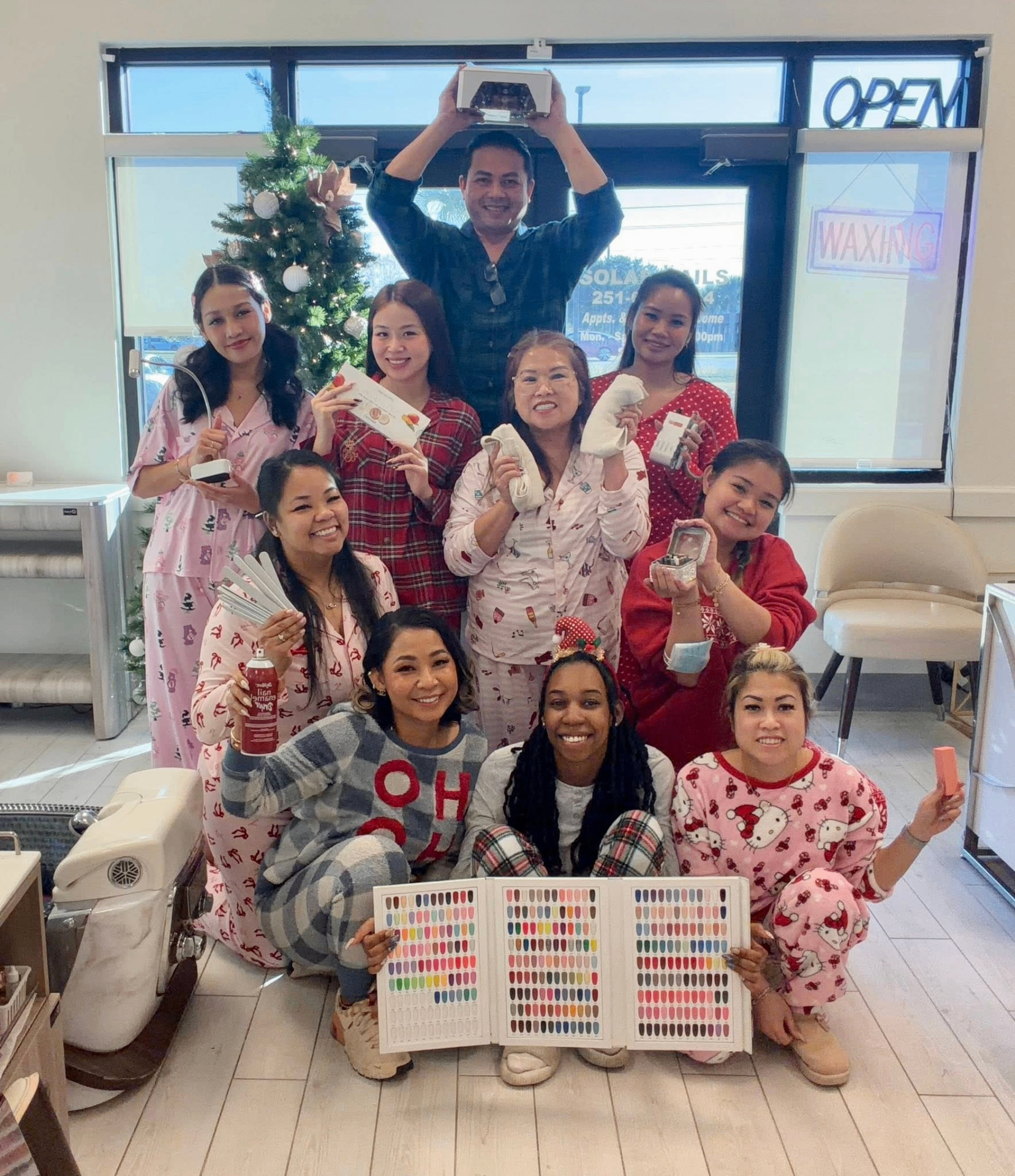 Solar Nails & Spa team celebrating