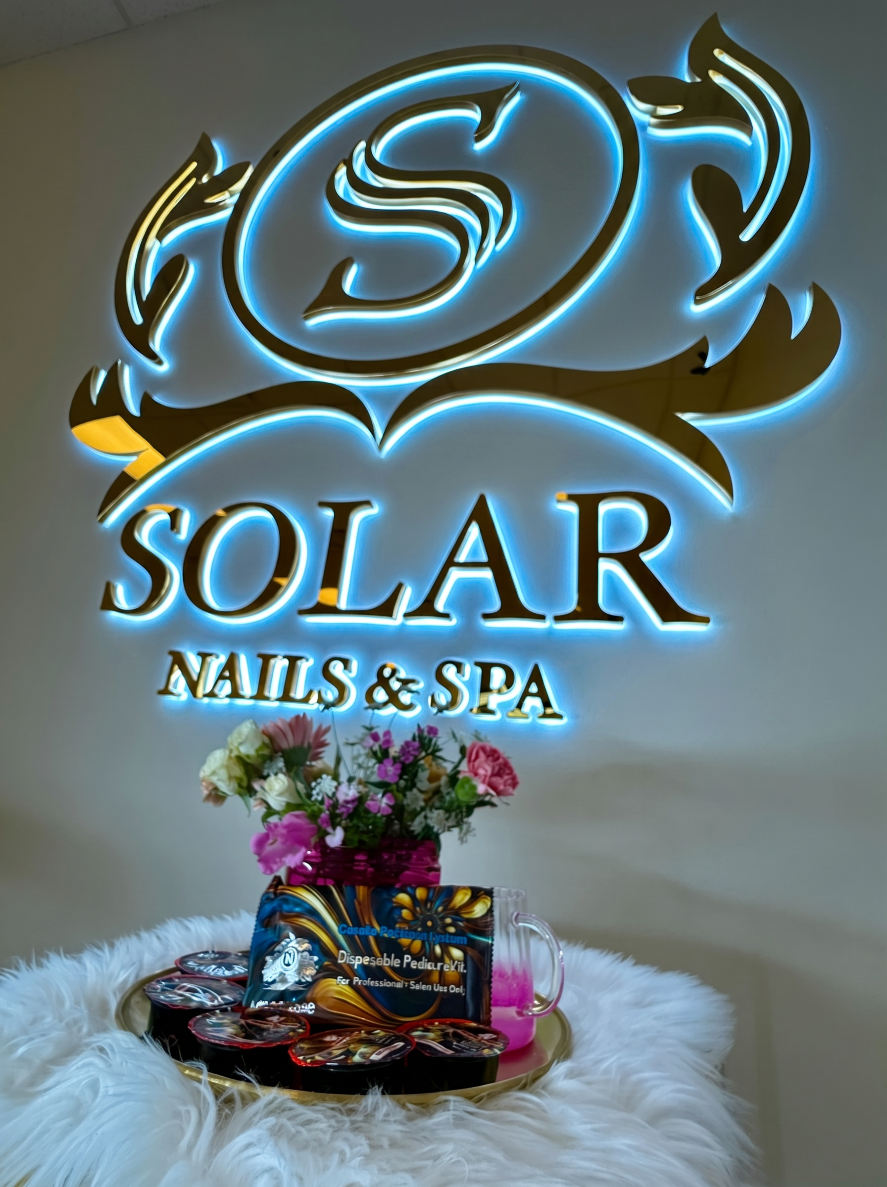 Solar Nails & Spa illuminated logo